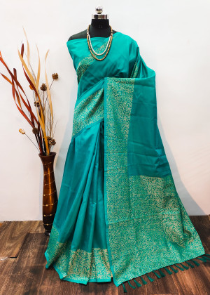 Sea green color raw silk saree with woven design