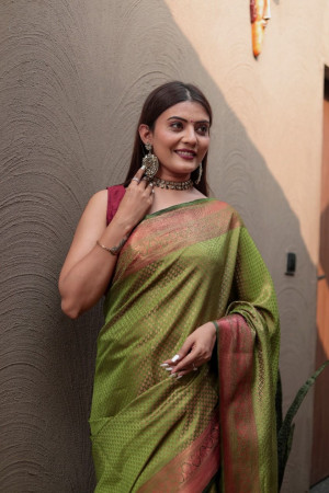 Mahendi green color soft fancy silk saree with zari woven work