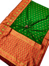 Green color soft banarasi saree with zari weaving work