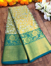 Green color kanjivaram silk saree with zari weaving work