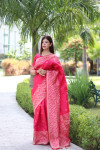 Pink color soft handloom raw silk saree with weaving work