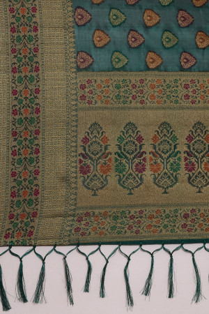 Rama green color soft organza silk saree with woven design