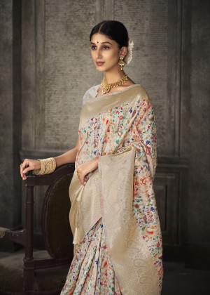 Cream color banarasi silk saree with zari weaving work