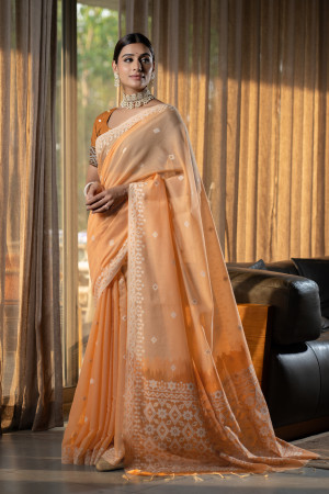 Orange color mulmul cotton saree with weaving work