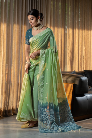 Pista green color mulmul cotton saree with weaving work