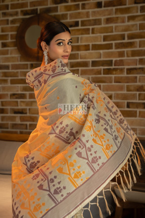 Mustard yellow color soft modal silk saree with woven design