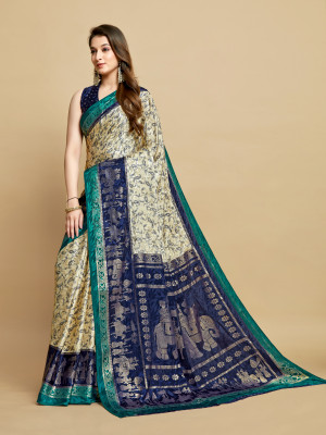 Off white and royal blue color soft jacquard silk saree with foil printed work