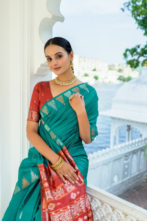 Rama green color soft tussar silk saree with zari weaving border