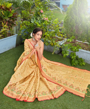 Beige color organza silk saree with zari weaving work