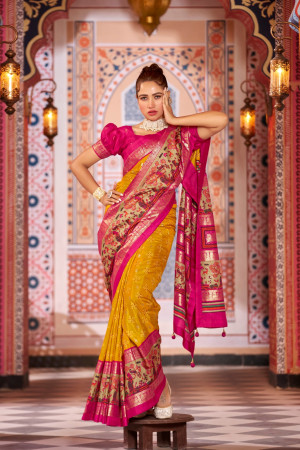 Yellow color patola silk saree with foil printed work