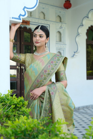 Pista green color soft organza silk saree with zari weaving work