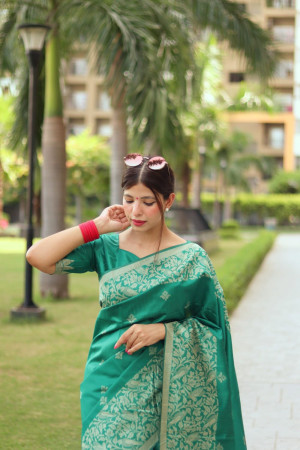 Rama green color soft handloom raw silk saree with weaving work