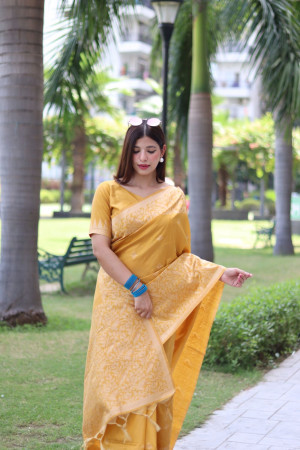 Yellow color soft handloom raw silk saree with weaving work