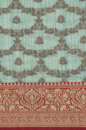 Sea green color katan silk saree with zari woven work