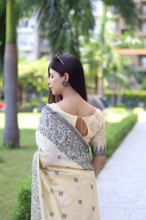 Off white color soft handloom raw silk saree with weaving work