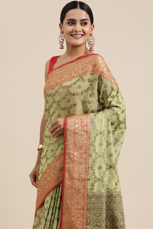 Pista green color katan silk saree with zari woven work