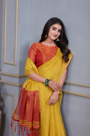 Mustard yellow color soft linen silk saree with zari weaving work