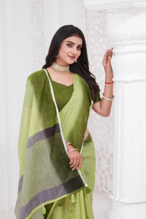 Pista green color linen cotton saree with woven design