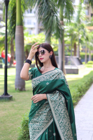 Dark green color soft handloom raw silk saree with weaving work