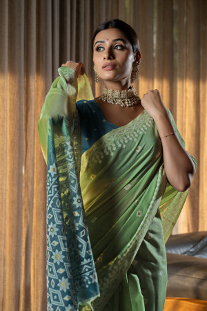 Pista green color mulmul cotton saree with weaving work