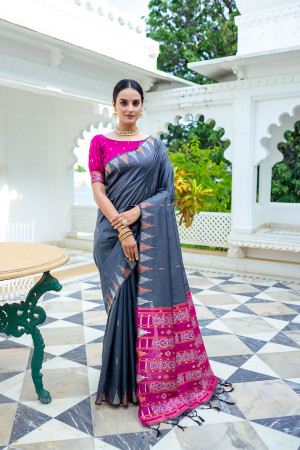 Gray color soft tussar silk saree with zari weaving border