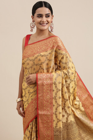 Yellow color katan silk saree with zari woven work