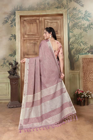 Dusty pink color linen cotton saree with zari weaving work