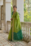 Pista green traditional raw silk saree with ikkat weaving work