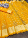 Yellow color doriya saree with zari woven border