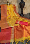 Yellow color raw silk saree with embroidered cut work