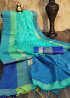 Sea green color raw silk saree with embroidered cut work