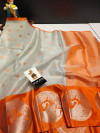 Orange and silver color tissue silk saree with zari weaving work