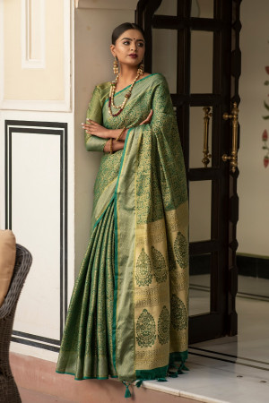 Green color soft kanchipuram silk saree with zari border