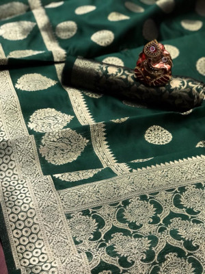 Dark green color soft banarasi silk saree with zari weaving rich pallu