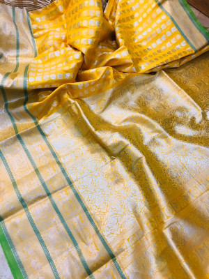 Yellow lichi soft silk saree with zari weaving work