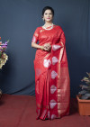 Red color soft linen saree with golden and silver zari woven work