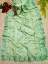 Pista green color organza silk saree with embroidery and butti work