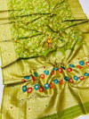 Green color soft kanchipuram silk saree with golden and silver zari weaving work