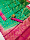 Green color baltan silk saree with golden zari weaving work