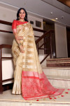 Beige color tussar silk weaving saree with temple woven border