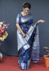 Navy blue color soft lichi silk saree with silver zari woven work