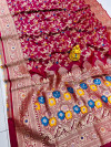 Magenta color soft kanchipuram silk saree with golden and silver zari weaving work