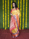 Yellow color kanchipuram silk saree with zari work