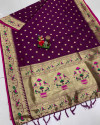 Dark magenta color paithani silk saree with golden zari weaving work