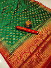 Dark green color baltan silk saree with golden zari weaving work