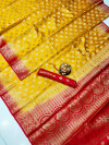 Yellow color baltan silk saree with golden zari weaving work