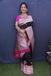 Black color paithani silk saree with golden zari work