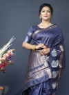 Navy blue color soft linen silk saree with golden zari weaving work