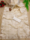 Cream color organza silk saree with embroidery and butti work