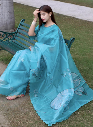 Rama green color organza silk saree with printed work